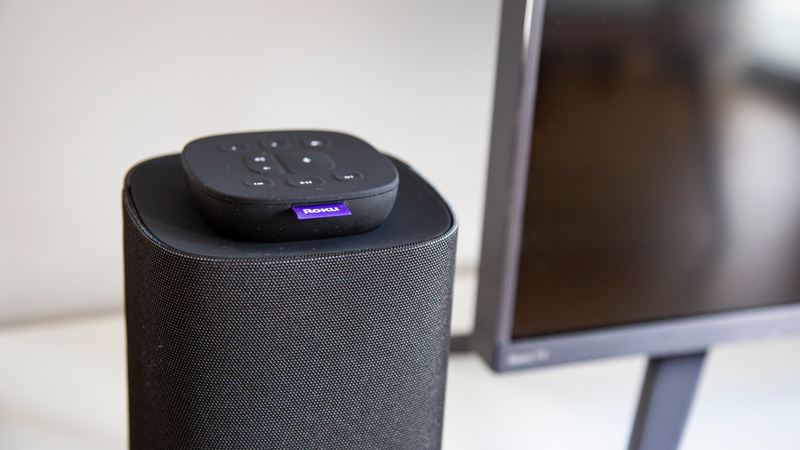 The Roku Touch tabletop remote fits handily on top of either speaker.